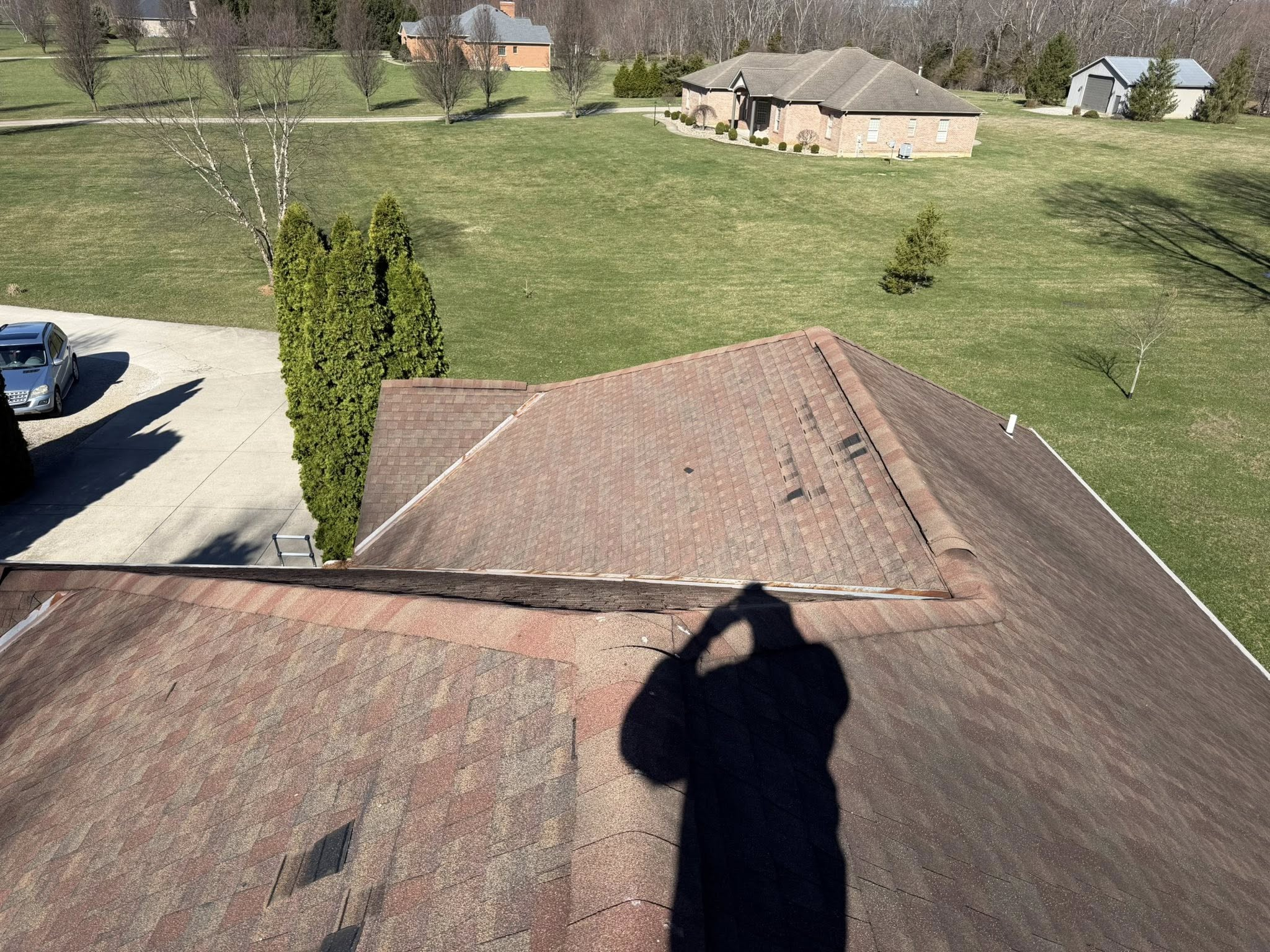 Aerial drone view of a residential roof during inspection